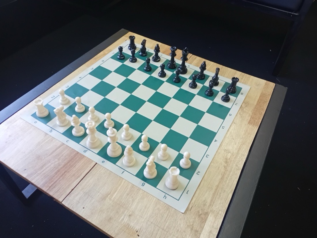 A chess board set and ready